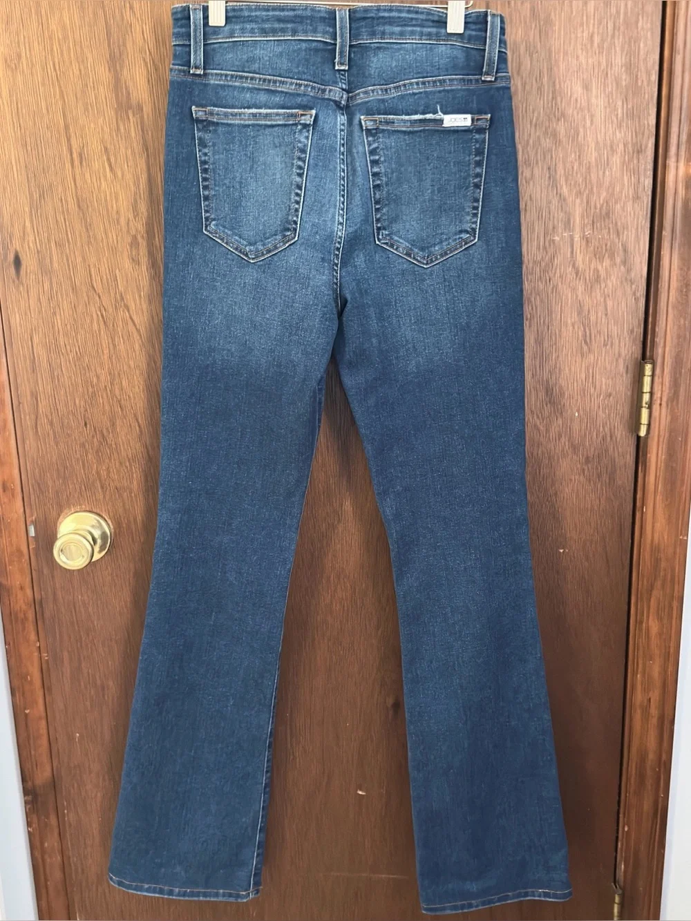 Joe’s Dark Blue Bootcut Jeans with whiskering and fading
